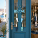 Ξύλινο κρεμαστό διακοσμητικό Welcome με ψάρια 18.5x46cm